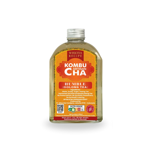 Bottle of Wisktea Recipe Artisan KombuCha with a yellow label on a white background