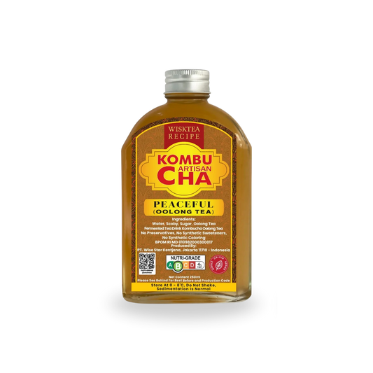 Bottle of Wisktea Recipe Artisan KombuCha Tea with a yellow label on a white background