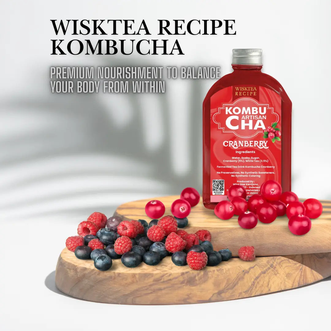 Wisktea Recipe Kombucha bottle with cranberries on a wooden board against a white background